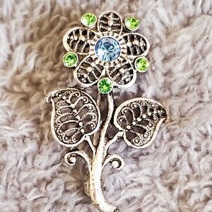Vintage Floral Brooch with Blue and Green Crystals.